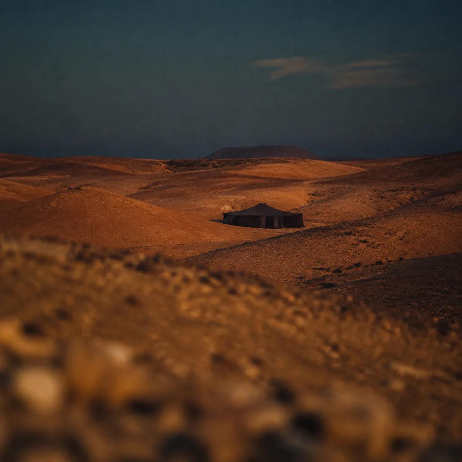 A desert camp under a sky full of stars in the Western Desert