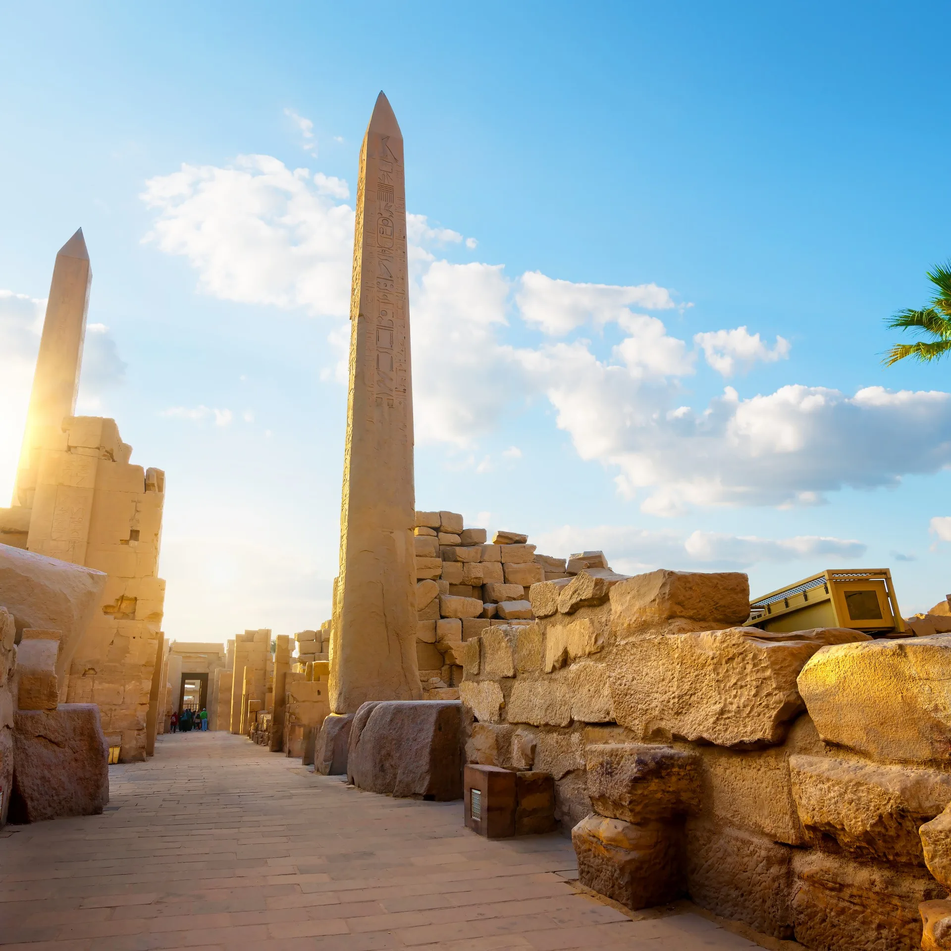 Ancient Egyptian obelisks at sunset, Luxor Temple.