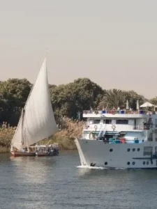 Felucca and nile river cruise sailing along the Nile River Egypt