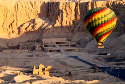 Colorful hot air balloon over desert landscape
