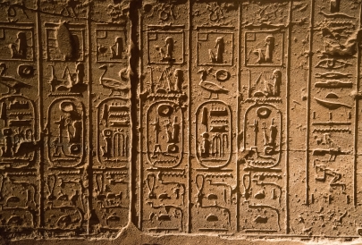 Ancient Egyptian hieroglyphs on a stone wall.