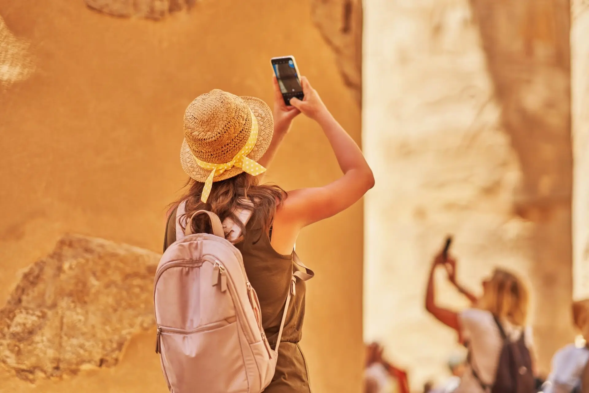 Tourist woman in Karnak Temple in Luxor Egypt