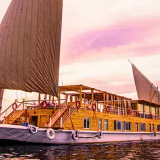 Sunset view from a Dahabiya Nile cruise deck
