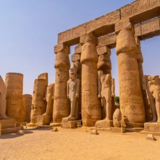 Sculptures of pharaohs and ancient Egyptian drawings on the columns of the Luxor Temple