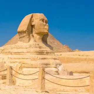 The Great Sphinx of Giza and in the background the Pyramids of Giza