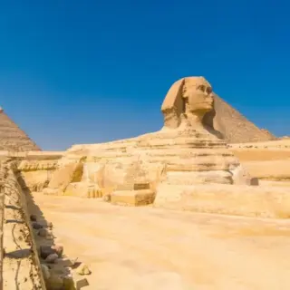 The Great Sphinx of Giza and in the background the Pyramids of Giza