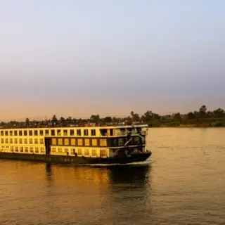 Tourist cruise sailing on the Nile River.