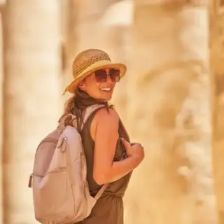Tourist woman in Karnak Temple in Luxor Egypt