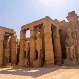 Sculptures of pharaohs and ancient Egyptian drawings on the columns of the What Luxor Is Known For luxor Luxor 2-Day Comfort Tour from Marsa Alam