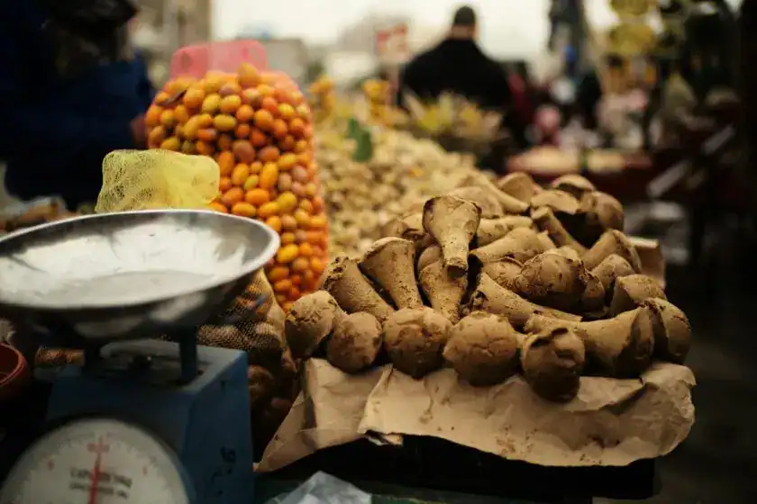 Vibrant Cairo market featuring a variety of fresh produce and spices. Egypt for Food Lovers