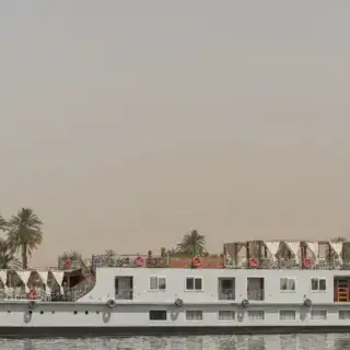 Luxury deck of Merit Dahabiya cruising the Nile