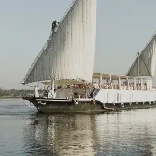 Karnak Dahabiya sailing along the Nile