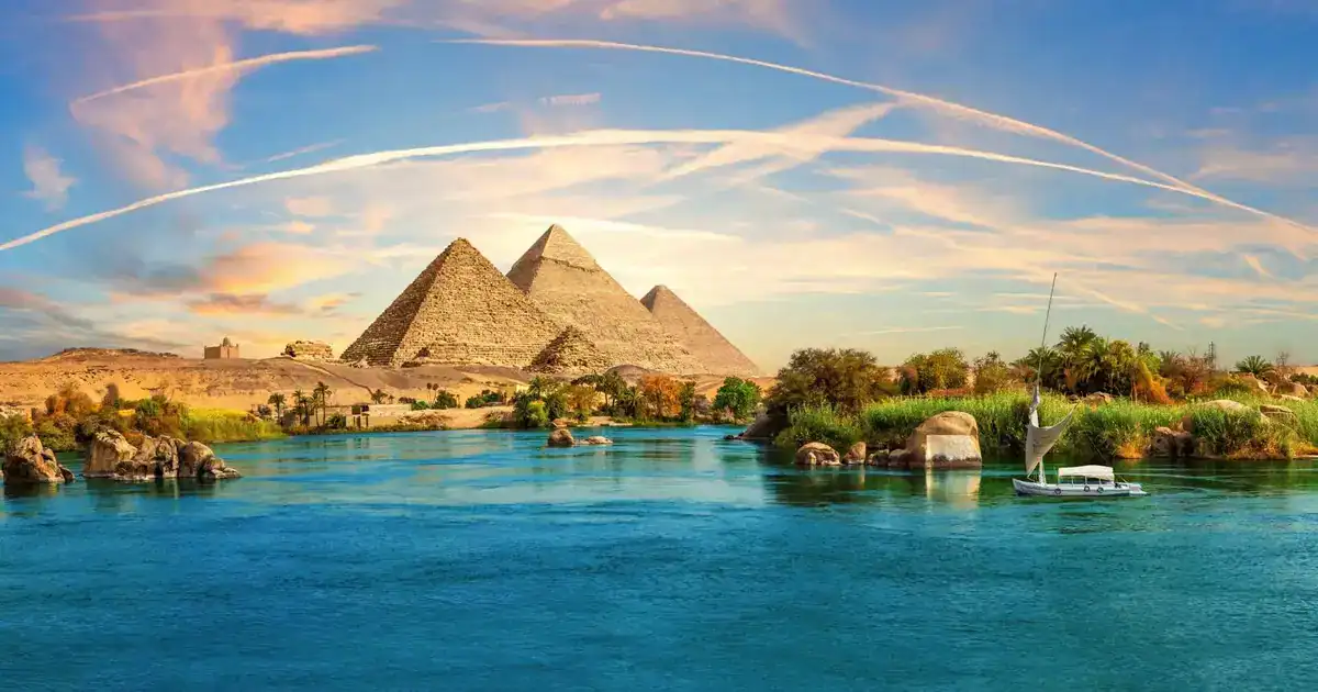 A professional tour guide explaining the history of the Pyramids to a group