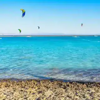 Snorkeling Tiran Island Blue Lagoon Dahab turquoise shallow waters and sandy shore in Sinai Egypt