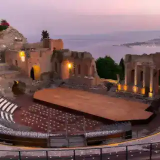 Sharm El Sheikh to Petra Roman Theater in Petra carved into rock with ancient seating tiers